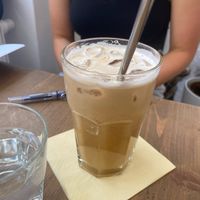 my iced latte with almond milk  at MyRaw Cafe in Prague