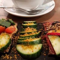 Toasts with avocado and beetroot dips at MyRaw Cafe in Prague