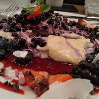 Pancakes with cashew cream and blueberries at MyRaw Cafe in Prague