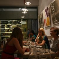 Interior with a nice art on the wall at MyRaw Cafe in Prague