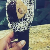 I had 2 flavours (1- Maori potato, parsley, citrus with kumara and raisins; and 2- coconut choc chip) in a dark chocolate deluxe cone. at Giapo in Auckland