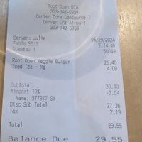 Price of vegan burger and iced tea with a 10% discount at DEN - Root Down - TC in Denver