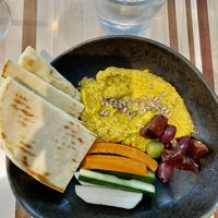 Carrot hummus, a little runny. Beautiful presentation   at DEN - Root Down - TC in Denver