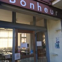 Sign on side of building at Cafe Bonheur in Tanabe