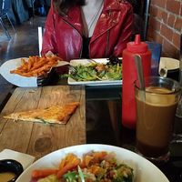 Me- Harvest bowl (vegan) friend- sweet potato fries & sesame ginger salmon (I think) at Lost Dog Cafe in Binghamton