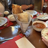 Garlic Naan with three different vegan curries, super tasty!  at Imlee in Bochum