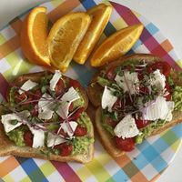 Avo toast with chive goat cheeze  and micro greens.  at Vromage Dairy-Free Cheese Shop in West Hollywood