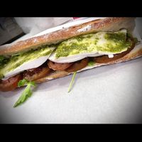 Veganzola , tomato, basil, pesto!   at Vromage Dairy-Free Cheese Shop in West Hollywood