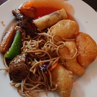 Fried sweet potatoes, Fried vegan shrimp, fried vegan chicken, fried pinapple, noodles m.m at Vegegården in Malmo