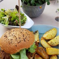 Yummy Lentil-Burger with potatoes + side salad (~14€) at Eugens Bio Cafe Restaurant in Konstanz