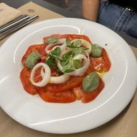 Ensalada de tomate con crema de albahaca  at Km.0 in San Sebastian