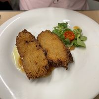 Seitán empanado con salsa de compota de manzana  at Km.0 in San Sebastian