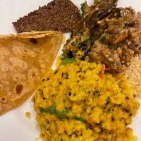 Main menu Dhall, and special Thai curry with bread.   at HōnestBar:Ibiza  in Ibiza