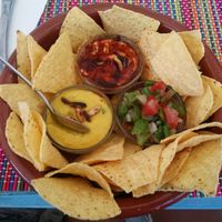 nachos with hummus, guacamole and harissa at HōnestBar:Ibiza  in Ibiza