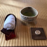 Matcha and pressed sugar sweet to begin the meal  at Kakusho in Takayama