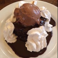 chocolate cake w/ ice cream and soy whip  at Brasserie LoLa in Paris