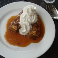 Delectable dessert with coconut whipped cream. at Brasserie LoLa in Paris