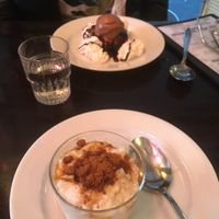 Gateau Tout Choco (chocolate cake with choco ice cream and soy whipped cream) and Riz Au Lait (rice pudding w/caramel). Great! at Brasserie LoLa in Paris