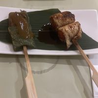 Tomato wrapped in tofu skin + some green mochi sort of thing  at Isoya Japanese Vegetarian in Hong Kong Island