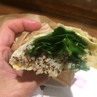 Wrap with hummus, spinach, quinoa, and sun-dried tomatoes. Tasty.  at Shake Cafe - Santa Maria Novella in Florence