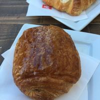 Two Vegan Brioche/Croissants 
The back one with Jam, the front is with chocolate. at Shake Cafe - Santa Maria Novella in Florence