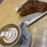 Apricot croissant with coconut milk flat white   at Shake Cafe - Santa Maria Novella in Florence