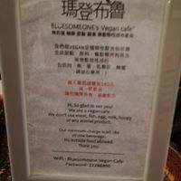 Notice on the tables at Veganday Cafe in Taichung