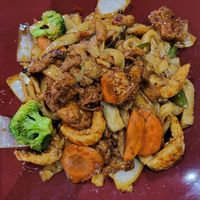 Drunken Noodles with vegan chicken and vegan shrimp. So flavourful! at Boualouang Laos & Thai Cuisine in Edmonton