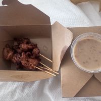Satay “chicken” skewers w/ peanut sauce  at Boualouang Laos & Thai Cuisine in Edmonton