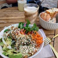 Vegan bowl and coffee with oat milk. at Café Littéraire Dos Hermanas - Cafe Dinan in Dinan