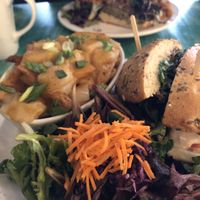 BLT with poutine upgrade, veggie pâté sandwich in the background at Antidote Bouffe Vegane in Montreal