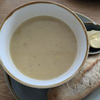 Leek and potato soup with coconut. Baguette with vegan spread. at Mudlarks Garden Cafe in Hertford