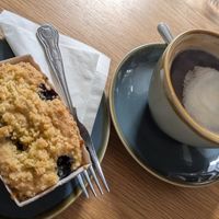 Black americano and vegan blueberry muffin. at Mudlarks Garden Cafe in Hertford
