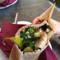 'Half and half' pita, half houmous, and half falafel, with a generous portion of fresh and pickled salads. at Humpit in Leeds