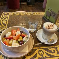 Fruit salad & caffè freddo  at Welt Cafe in Vienna