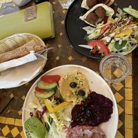 Hummus mix platter & Falafel Pita  at Welt Cafe in Vienna