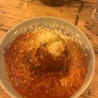 Arancini with tomato sauce and Parmesan  at Sicilian NQ - Restaurant and Bar in Manchester
