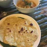 potato and aubergine  curry with roti at Pun Pun Organic Vegetarian Restaurant in Chiang Mai
