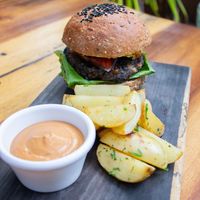 Black Bean Burger 🌱🍔   at Raw Love - Ahau Tulum Beach in Tulum