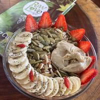 Chocolate Dream smoothie bowl with added cashew butter on top at Raw Love - Ahau Tulum Beach in Tulum