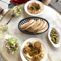 garbanzo beans hummus & falafel hummus  at Hummus Bar in Lund