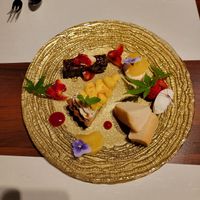 Dessert plate. Incredible sponge cake with soy whipped cream, pinapple tart, and chocolate brownie/cake thing. All fantastic.  at Little-Heaven in Kyoto