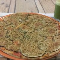 Vegan parmigiana pizza at Dolce Pizza y Los Veganos - Hipolit Lazaro in Barcelona