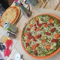 Ragu in the background, pesto and chorizo in the foreground! Great vegan eats at Dolce Pizza y Los Veganos - Hipolit Lazaro in Barcelona