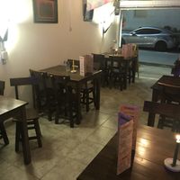 Seating. In total for 24 people (six tables that fit four people on each) at El Punto Veggie in Salento