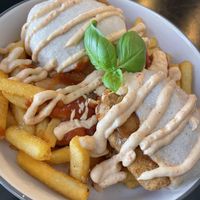 Chicken Parma, cashew cheese and fries  at MARIA in Berlin