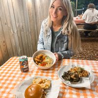 The outdoor area under tea lights 💡  at Dharma Southern Chick'n in Orlando