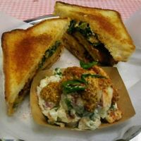 Fried Green Tomato Sandwich & Tater Salad. 2021 at Dharma Southern Chick'n in Orlando