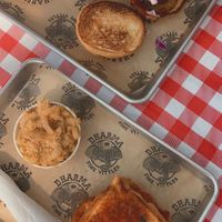 nashville hawt chix w homies on top, florida fried green tomatoes w garlic mac on bottom at Dharma Southern Chick'n in Orlando