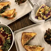 Don’t forget the sides of Brussel sprouts!   They have so many good sides.  Also shown is the kale salad, TLT, a taco special, and of course the fried green tomato sandwich  at Dharma Southern Chick'n in Orlando